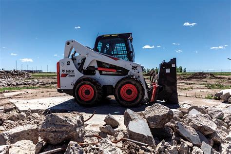 who invented skid steer|history of skid steer loaders.